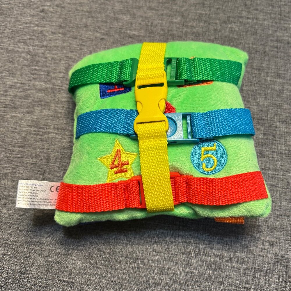 BUCKLE TOYS - "Buster Square" Soft square pillow w/ 6 kid-friendly buckles